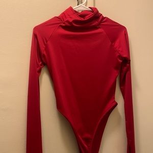 red turtle neck body suit